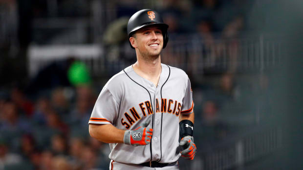 SF Giants catcher Buster Posey (28) smiles after hitting a home run. (2017)